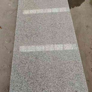 贵阳芝麻白光面毛板